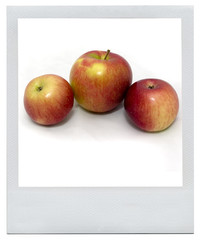apples in the polaroid frame