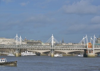 charing cross bridge and boats on the thames