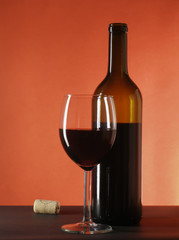 still-life with wine bottle and glass