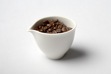 cup full of colombian coffee beans