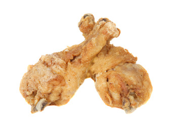 two crispy golden brown fried chicken legs