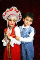 the boy and the girl in suits.