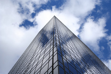 corner of modern building against blue sky