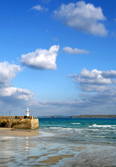 the incoming tide at st. ives, cornwall.