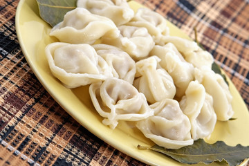 ravioli with meat and bay leaf