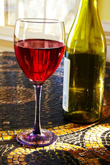 bottle and glass of red