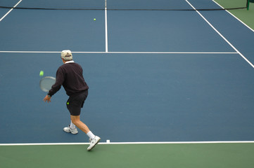 retiree playing tennis