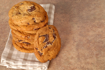 a stack of delicious chocolate chunk cookies