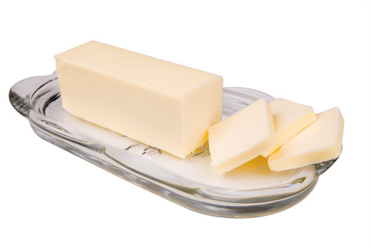 Sliced Butter On A Glass Dish