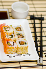 sushi (rolls) on a plate