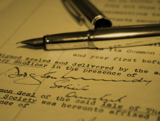 business document signed with fountain pen