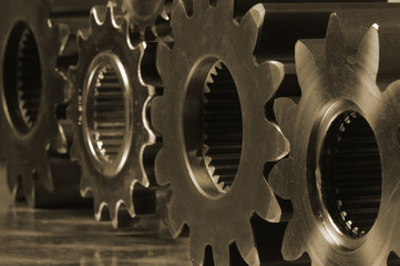 gear and metals in deep sepia toning
