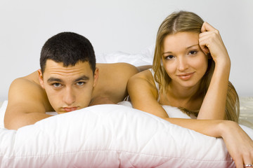 young couple in the bed