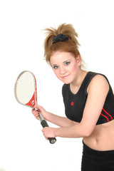 young girl with a tennis racket