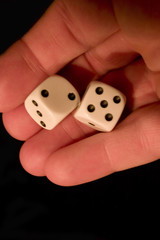 dice in hand
