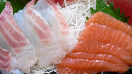 served japanese raw fish (sashimi)
