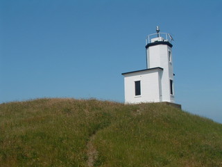 Fototapeta na wymiar a lighthouse on firday harbor