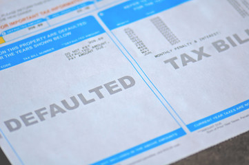 defaulted tax bill