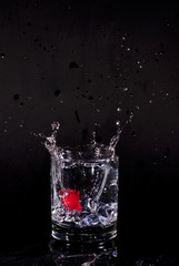 glass of vodka splashing