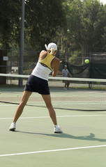 young woman playing tennis