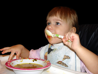 child with the soup