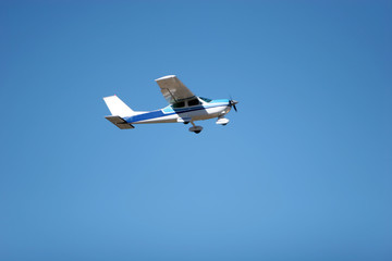 small airplane flying away