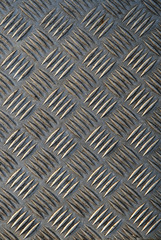 close up of a section of metal plate floor grip.