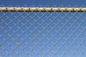 metal chain link perimeter security fence.