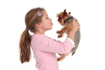 girl holding her dog
