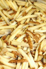 a group of raw french fries