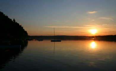 Fototapeta na wymiar bay boats at sunset