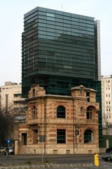 Obraz premium new building raised from an old one, bucharest, ro