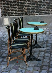 typical outdoor cafe tables in paris