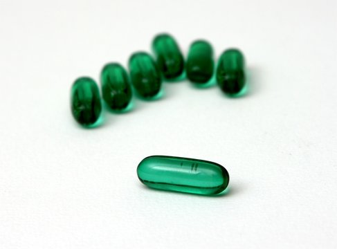 transparent green pills