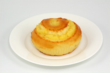 sweet bun on white plate