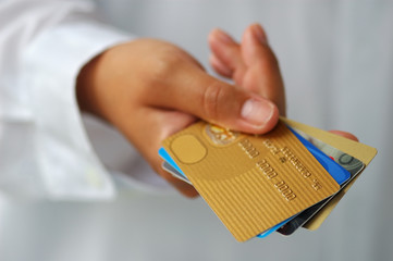 hand with credit cards