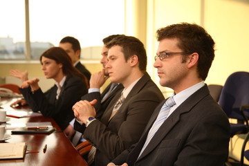 five professional people at the formal meeting.