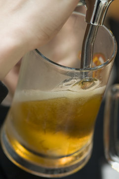 filling of beer mug.