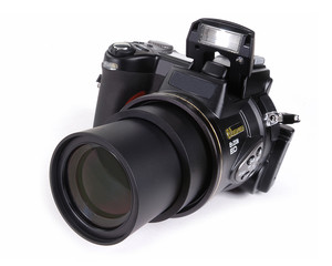 digital slr camera with attached zoom lens