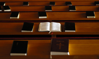 open bible in the church - Powered by Adobe