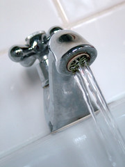 photo bathroom tap, water running - craig westwood