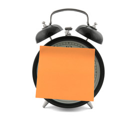 alarm clock with a note