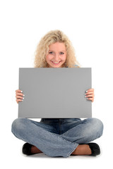 woman holding blank sign