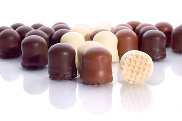 Obraz na płótnie Canvas rows of mousse chocolate candies