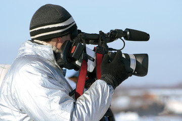 journalist with a videocamera