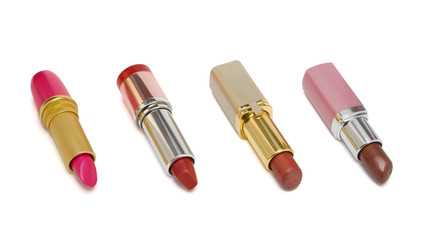 Obraz premium four multicolored lipstick
