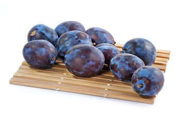 dark blue ripe fleshy plums