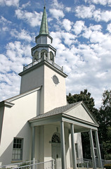 white church and clouds