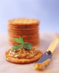 wheat crackers with garlic spread and parsely
