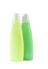 two bottles of green shampoo